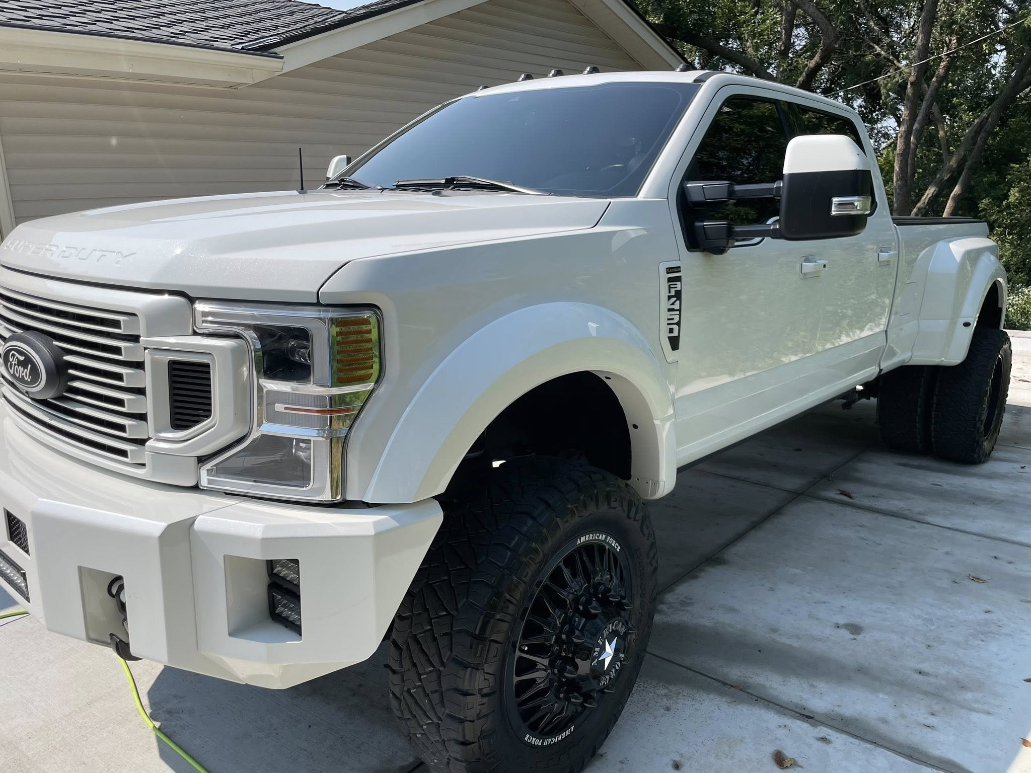 Applying ceramic coating to a bright green car panel
